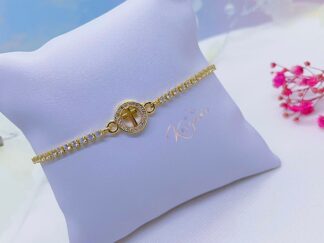 Pulsera cruz dorada